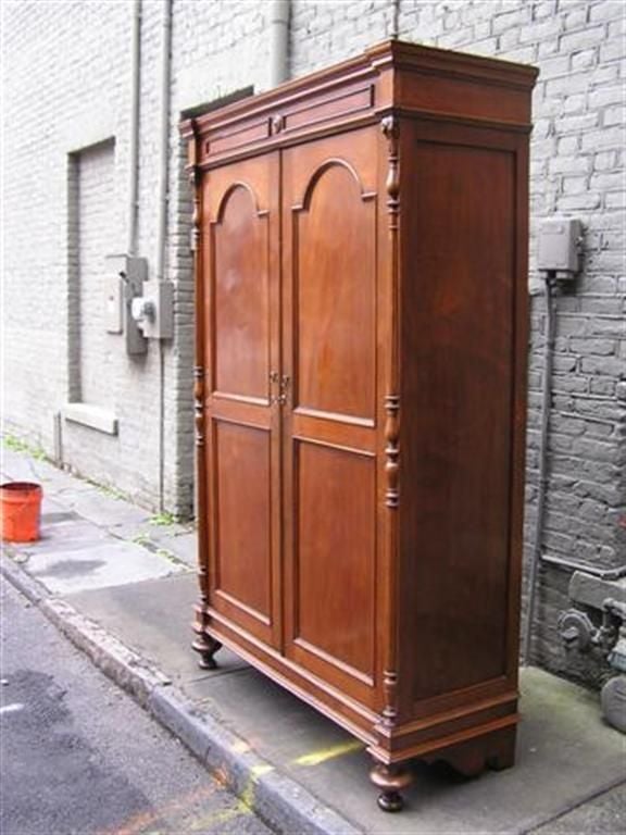 Hand-Carved American Walnut Hinged Armoire with Arched Doors and Interior Shelving. C. 1810 For Sale