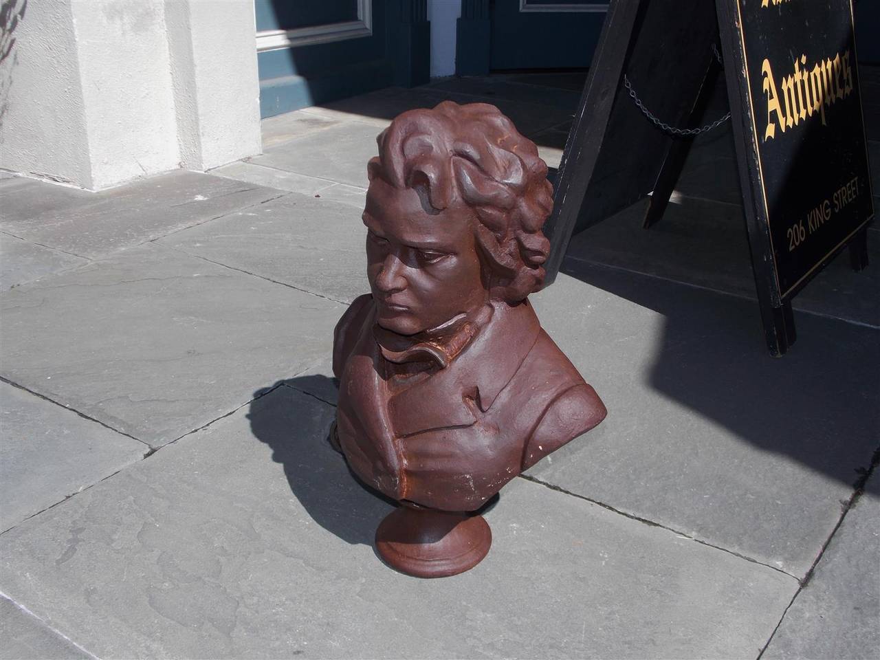 Ludwig van Beethoven cast iron bust resting on round plinth, Late 20th century.