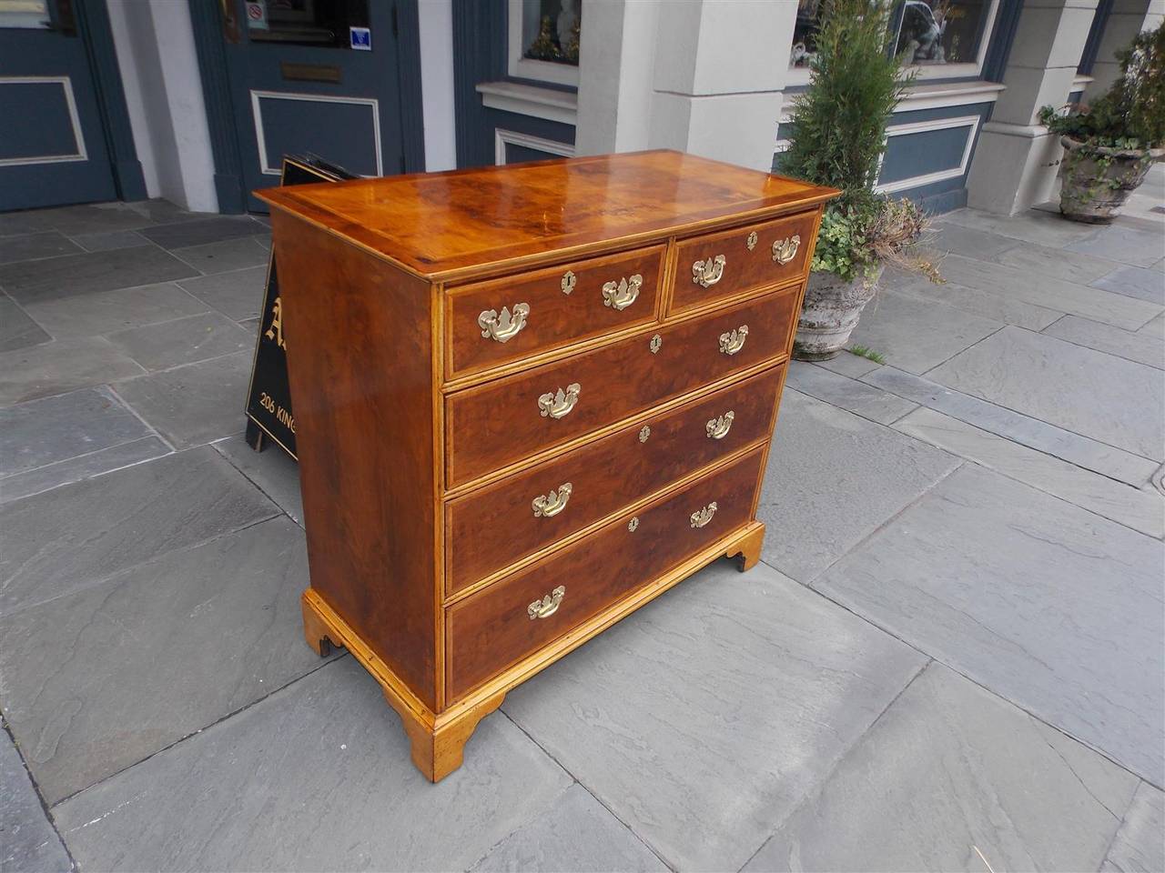 American Chippendale figured burl walnut and Yagrumo Macho graduated five drawer chests with feather banding, original brasses, and terminating on the original bracket feet. White pine secondary wood.
Boston, Late 18th century