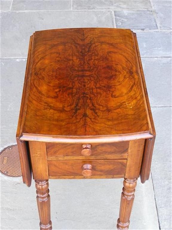 English Burl Walnut two drawer drop leaf humidor table with turned legs and original brass casters. Humidor has original marble and tin interior.