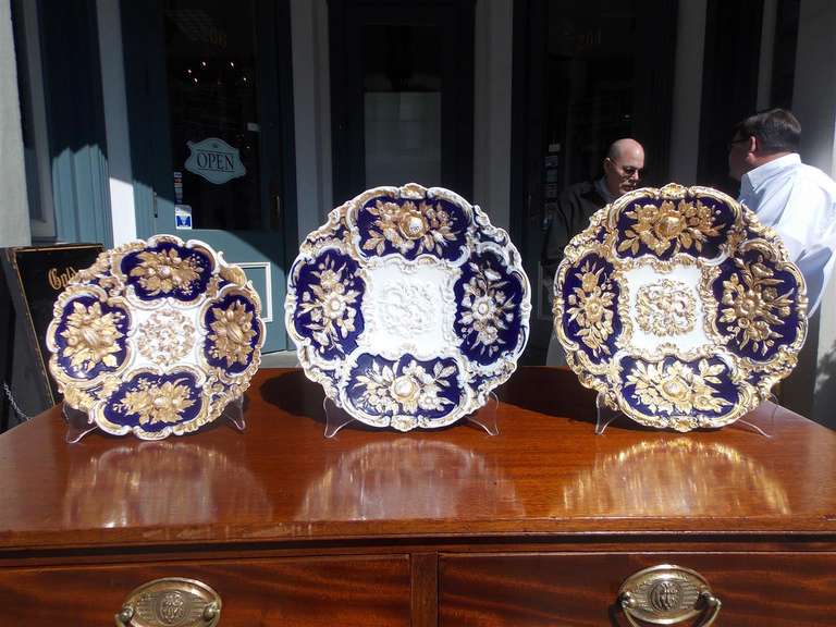 Set of Three Meissen Painted and Gilt Plates. Circa 1740