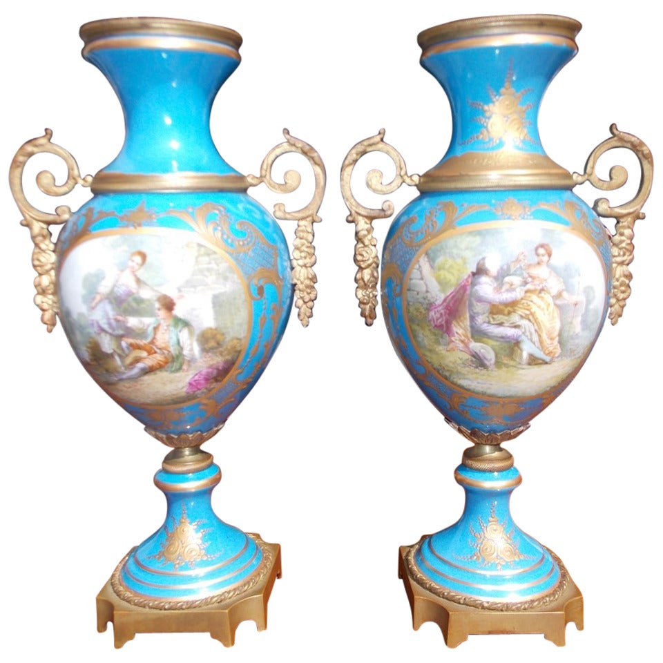 Pair of Sevres Vases with Ormolu Mounts. Circa 1830