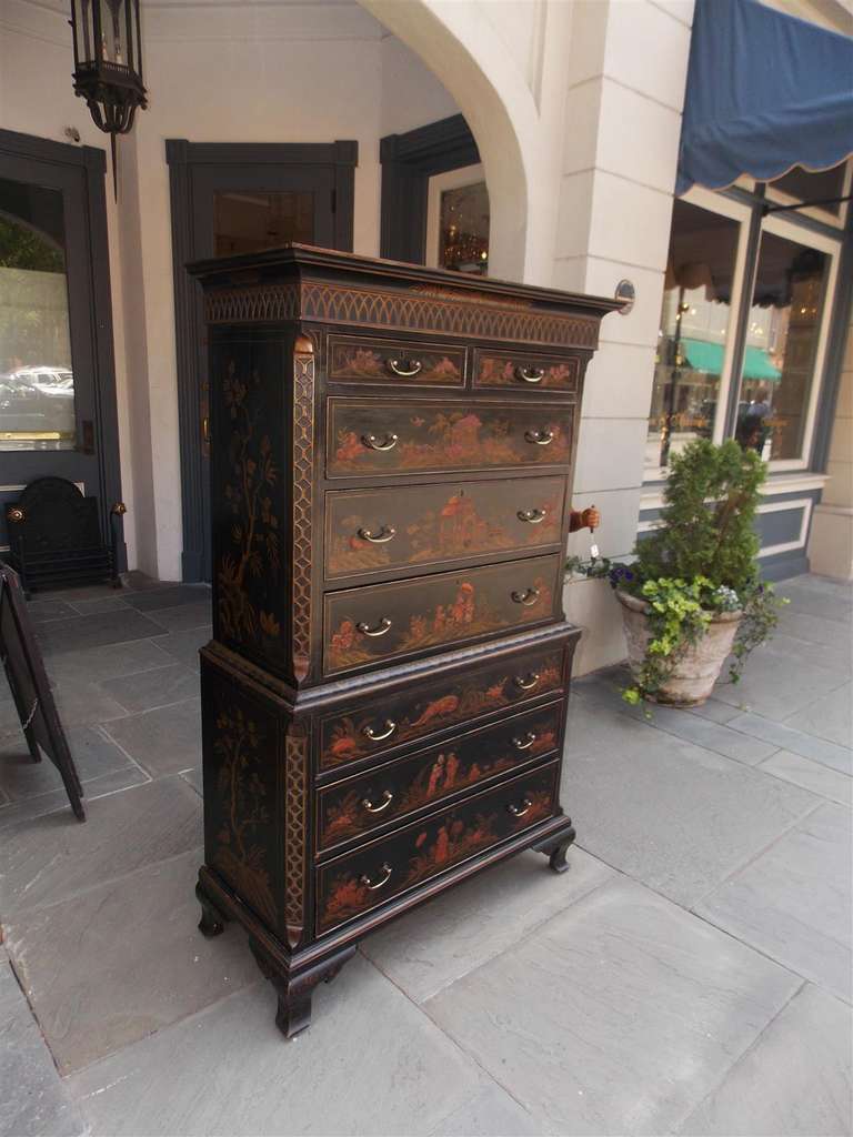 English Chippendale Chinoiserie eight drawer chest on chest with original brasses, carved fret work, and terminating on bracket feet.  Early 19th Century
