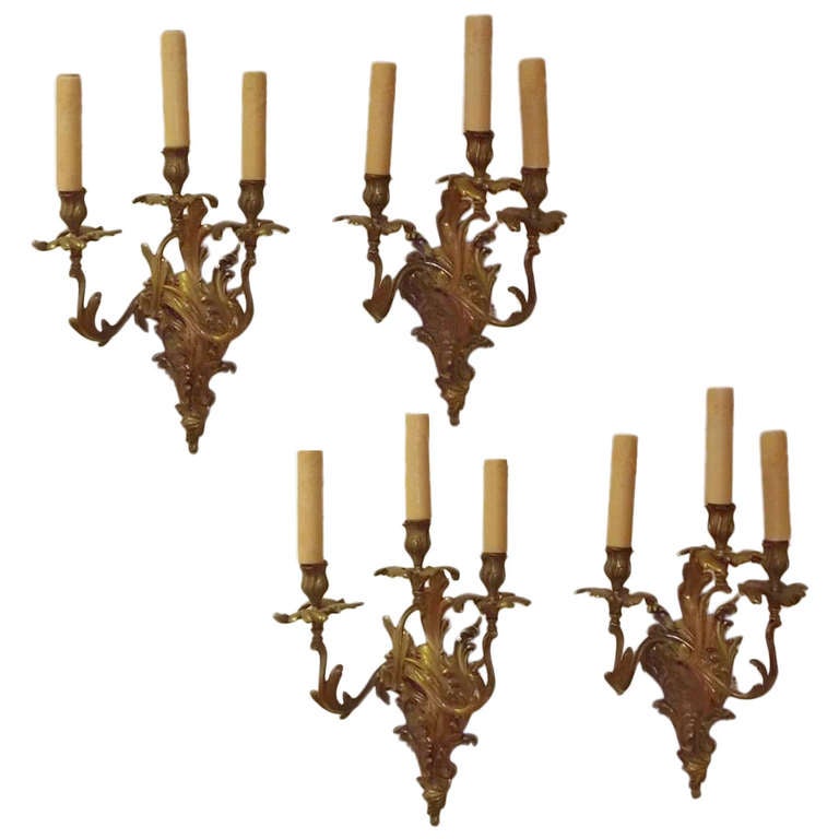 Set of Four French Gilt Bronze Three Arm Sconces, Circa 1820