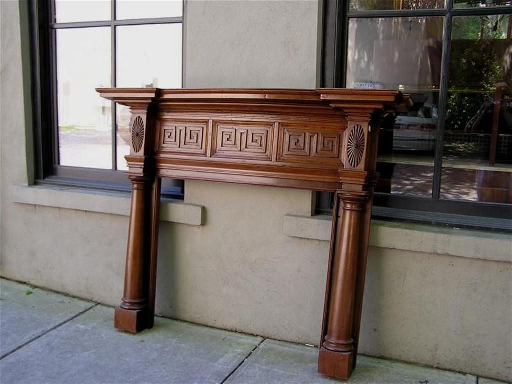 American fire place mantel made of poplar with Greek key motif and carved corner sunburst supported by turned column legs. All original . Early 19th Century . Fire Box measurements  39 