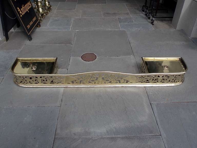 George II English Brass Serpentine Engraved Fire Place Fender with Flanking Trivets C 1760 For Sale