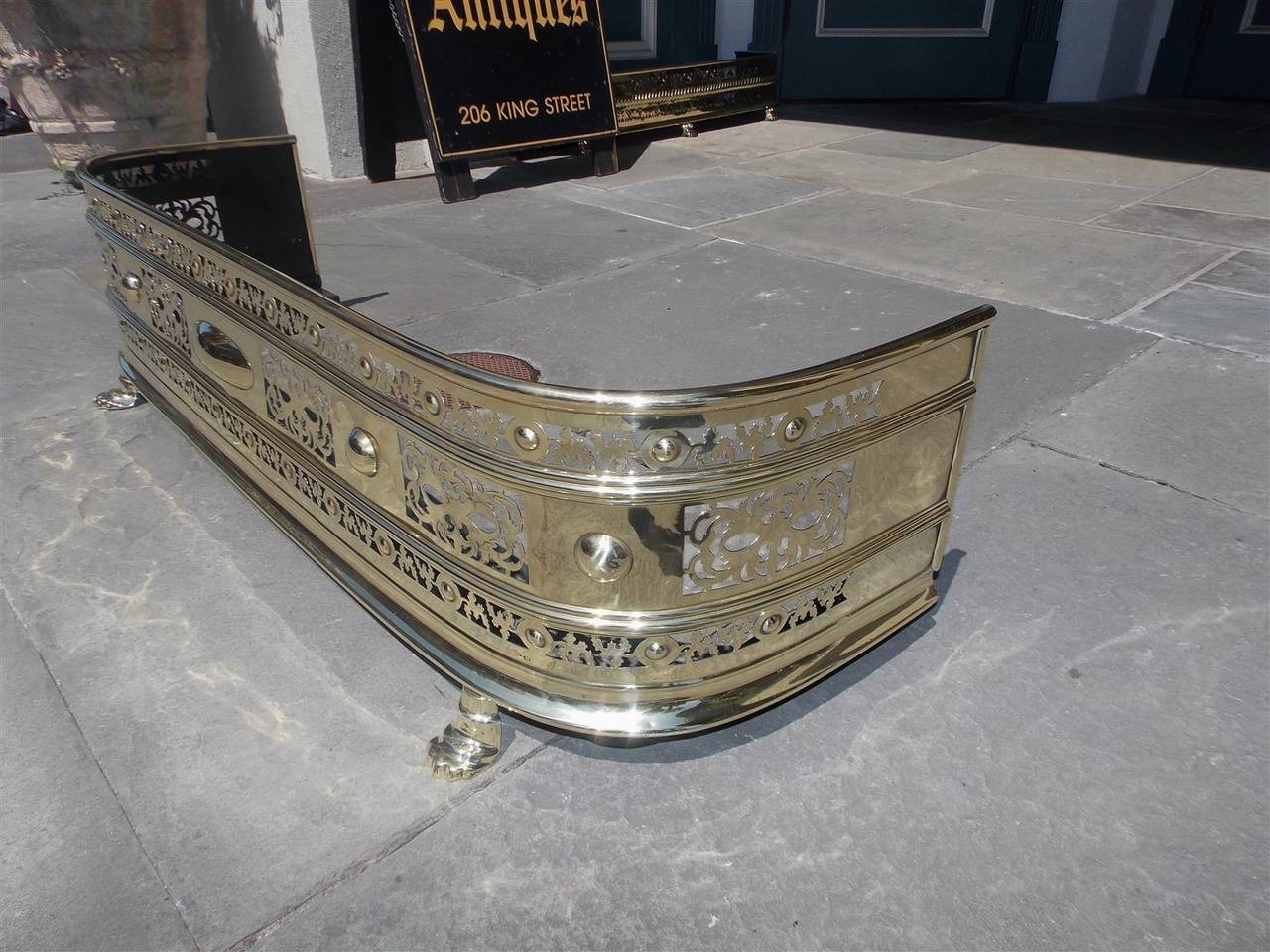 Early 19th Century English Regency Brass Hand Chased and Bossed Fire Fender, Circa 1810 For Sale