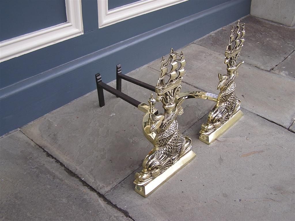 American Empire Pair of American Brass Intertwined Dolphin & Ship Andirons. Circa 1840 For Sale