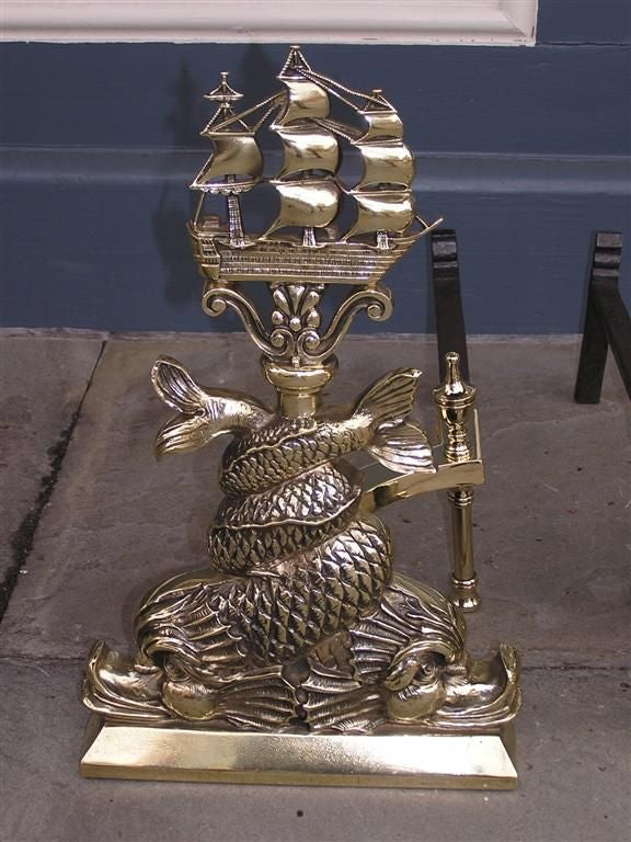 Cast Pair of American Brass Intertwined Dolphin & Ship Andirons. Circa 1840 For Sale