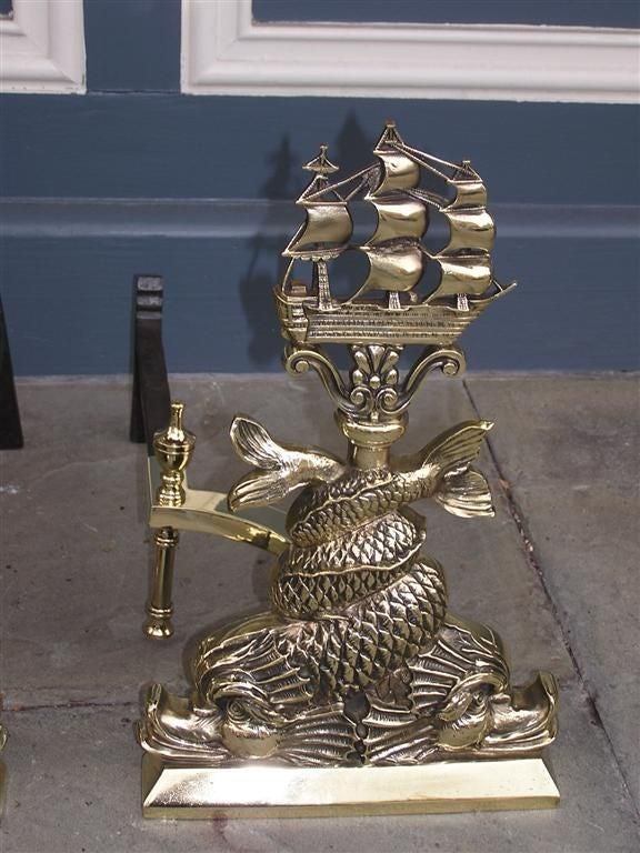 Pair of American Brass Intertwined Dolphin & Ship Andirons. Circa 1840 In Excellent Condition For Sale In Hollywood, SC