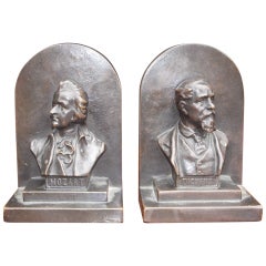 Coppia di fermalibri americani in bronzo "Mozart e Dickens", circa 1880