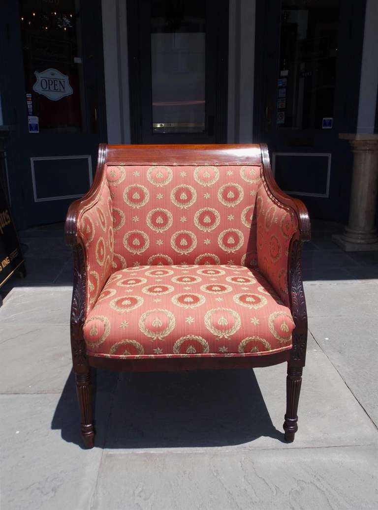 American mahogany chair upholstered in Napoleon Bee silk, carved acanthus serpentine arms , floral medallions, and terminating on turned bulbous reeded legs. Baltimore, Early 19th Century