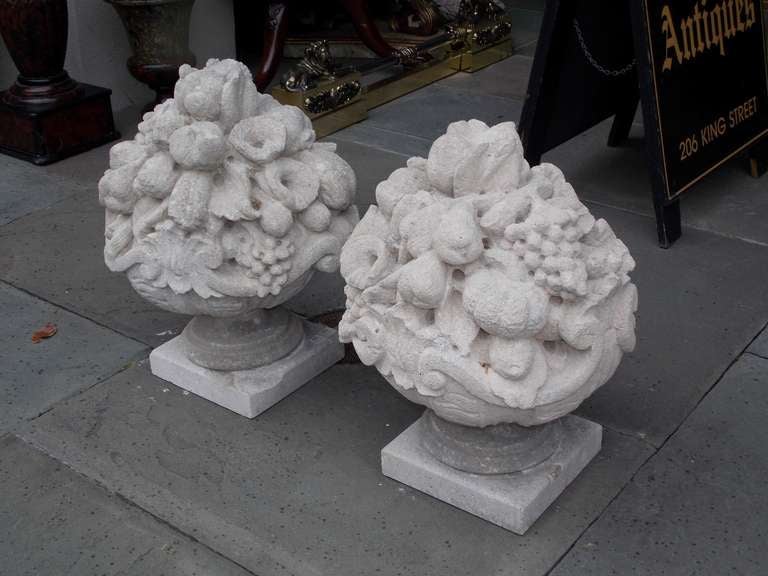 Mid-19th Century Pair of Italian Hand Carved Sandstone Fruit Baskets on Plinths. Circa 1830