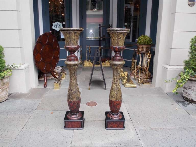 Pair of English Faux Painted Campaign Urns on Bulbous Columns. 19th Century