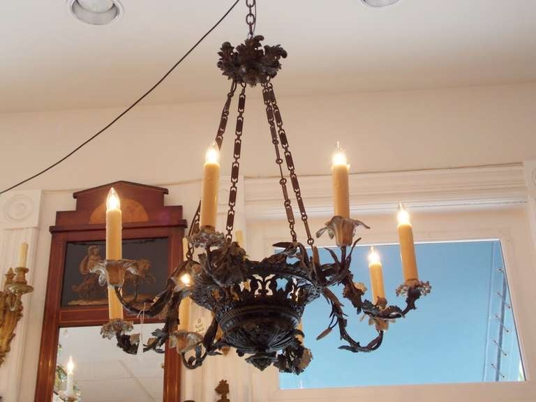French lead hand painted eight arm chandelier with floral motif. Originally candle powered. Dealers please call for trade price.