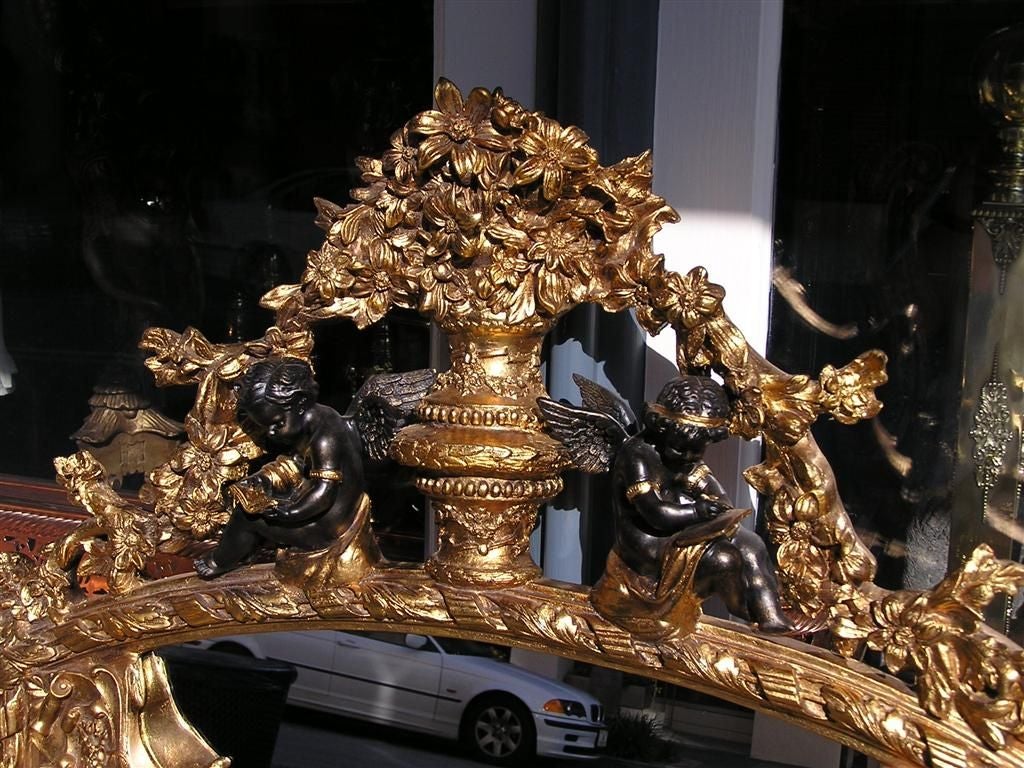 Early 19th Century French Carved Wood & Gilt Cherub Acanthus Wall Mirror. Circa 1820. For Sale
