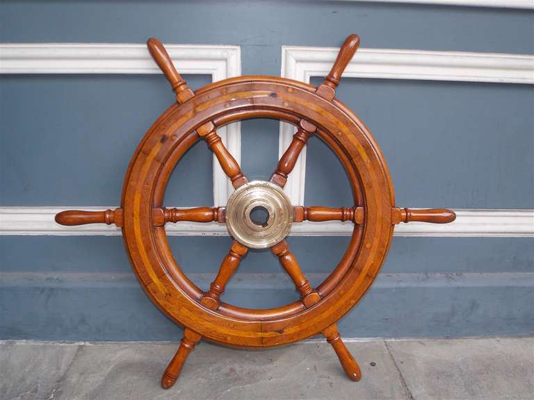American Walnut classic six spoke yacht wheel with brass hub. Late 19th Century