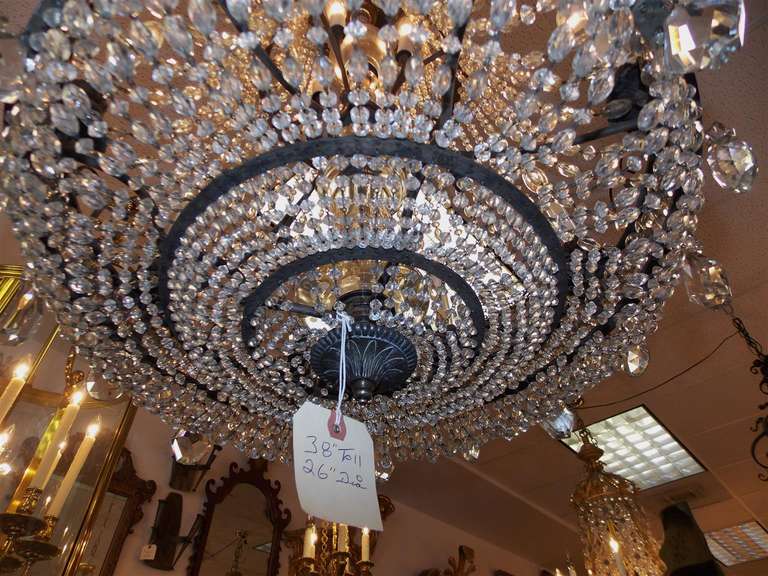 French Bronze and Crystal Three-Tiered Chandelier. Circa 1820 1