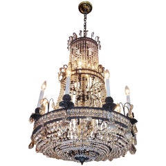 French Bronze and Crystal Three-Tiered Chandelier. Circa 1820