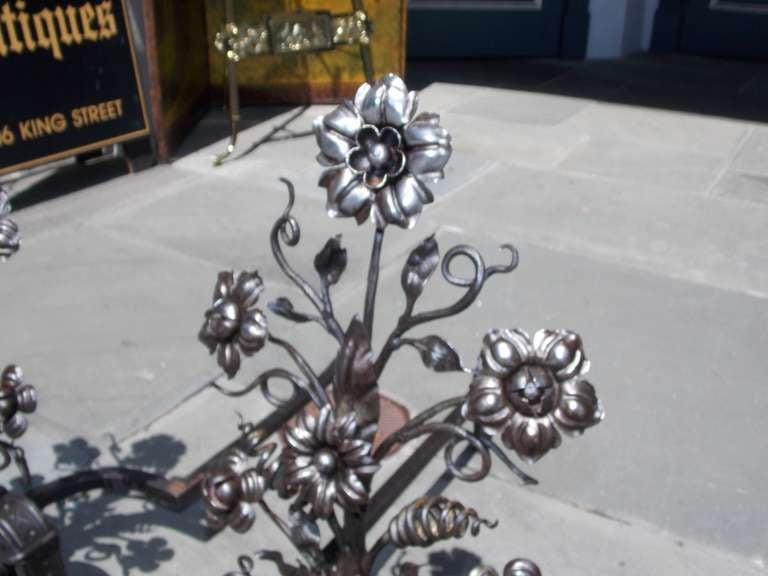 Hammered Pair of Italian Wrought Iron and Floral Andirons with Scroll Legs. Circa 1830 For Sale