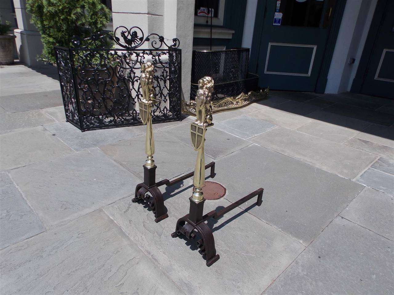 English Brass and Wrought Iron Lion Shield Andirons, Circa 1820 In Excellent Condition For Sale In Hollywood, SC