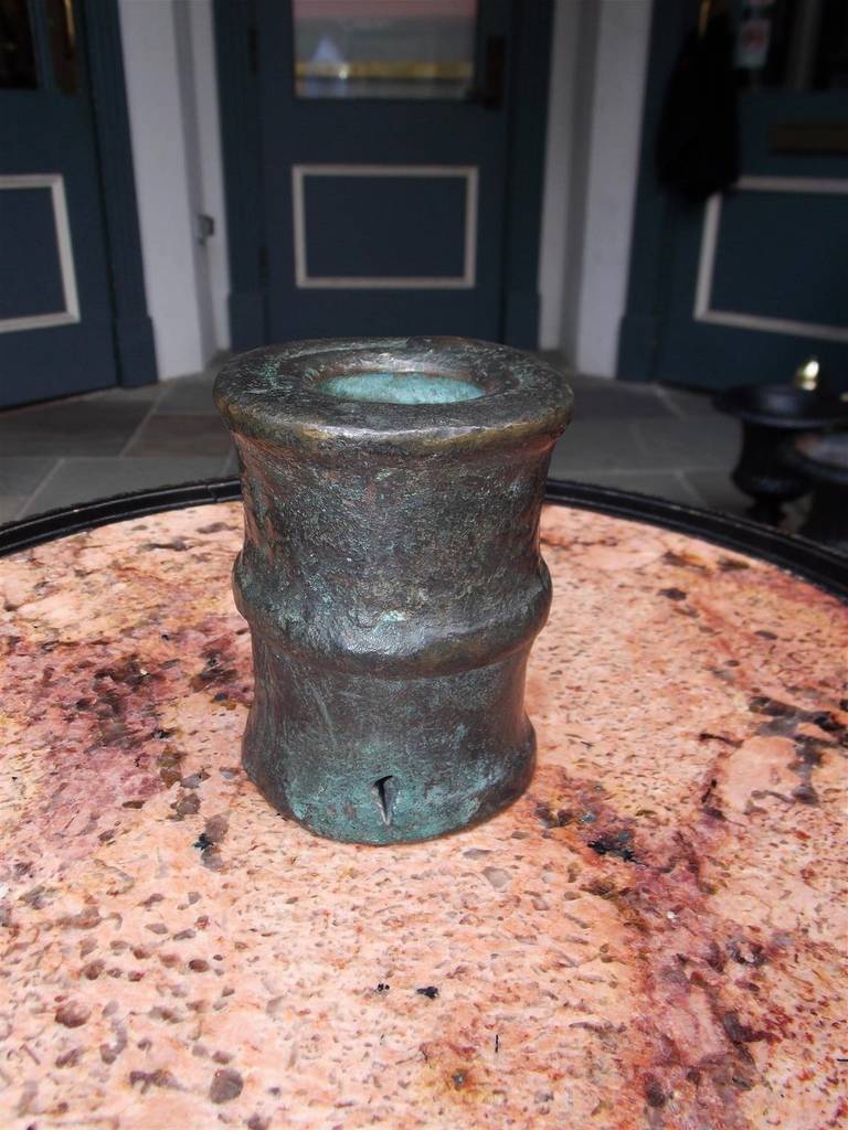 Spanish bronze nautical signal cannon from a shipwreck off the coast of Ecuador. Isle de muerto.  The island, nicknamed Isla de Muerto (Isle of Death) was a routine stopover for the Spanish Armada, carrying treasure from Chile and Peru to Panama and