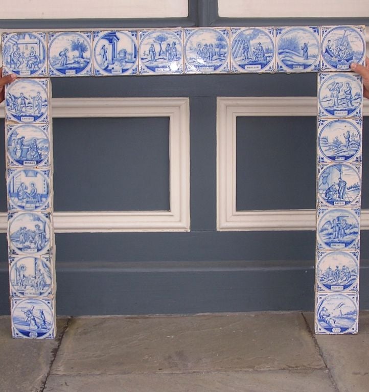 Delft Tile fireplace surround with religious scenes accompanied with verses.  Dealers please call for trade price.