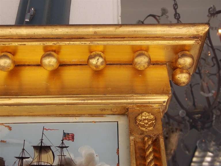 Early 19th Century American Classical Eglomise Gilt Mirror with Rope and Medallion Carvings C. 1815 For Sale