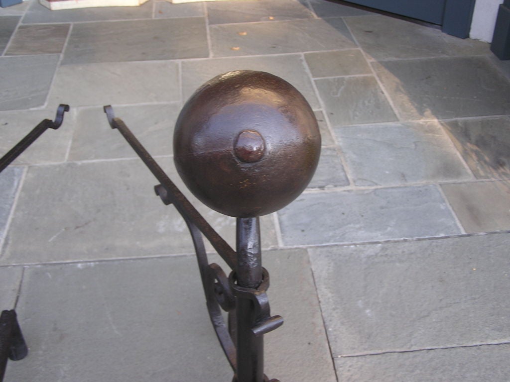 American Colonial Pair of American Wrought Iron Ball Top Andirons with Penny Feet. Circa 1780 For Sale
