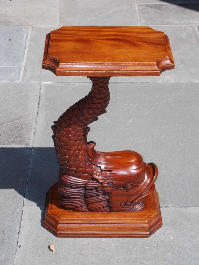 English Regency Honduran mahogany pedestal table with carved dolphin motif.  Dealers please call for trade price.