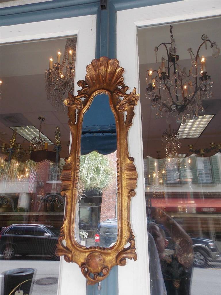 18th Century and Earlier Pair of Italian Shell Crested Gilt Wall Mirrors.  Circa 1780