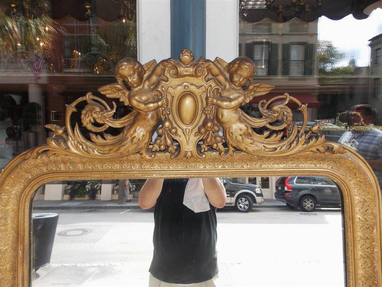 18th Century and Earlier French Gilt Carved Wood Cherub Wall Mirror. Circa 1790 For Sale