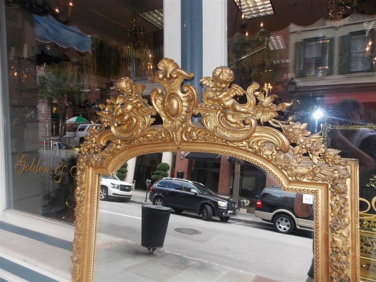 French Gilt Carved Wood Floral and Cherub Wall Mirror.  Circa 1790 For Sale 1