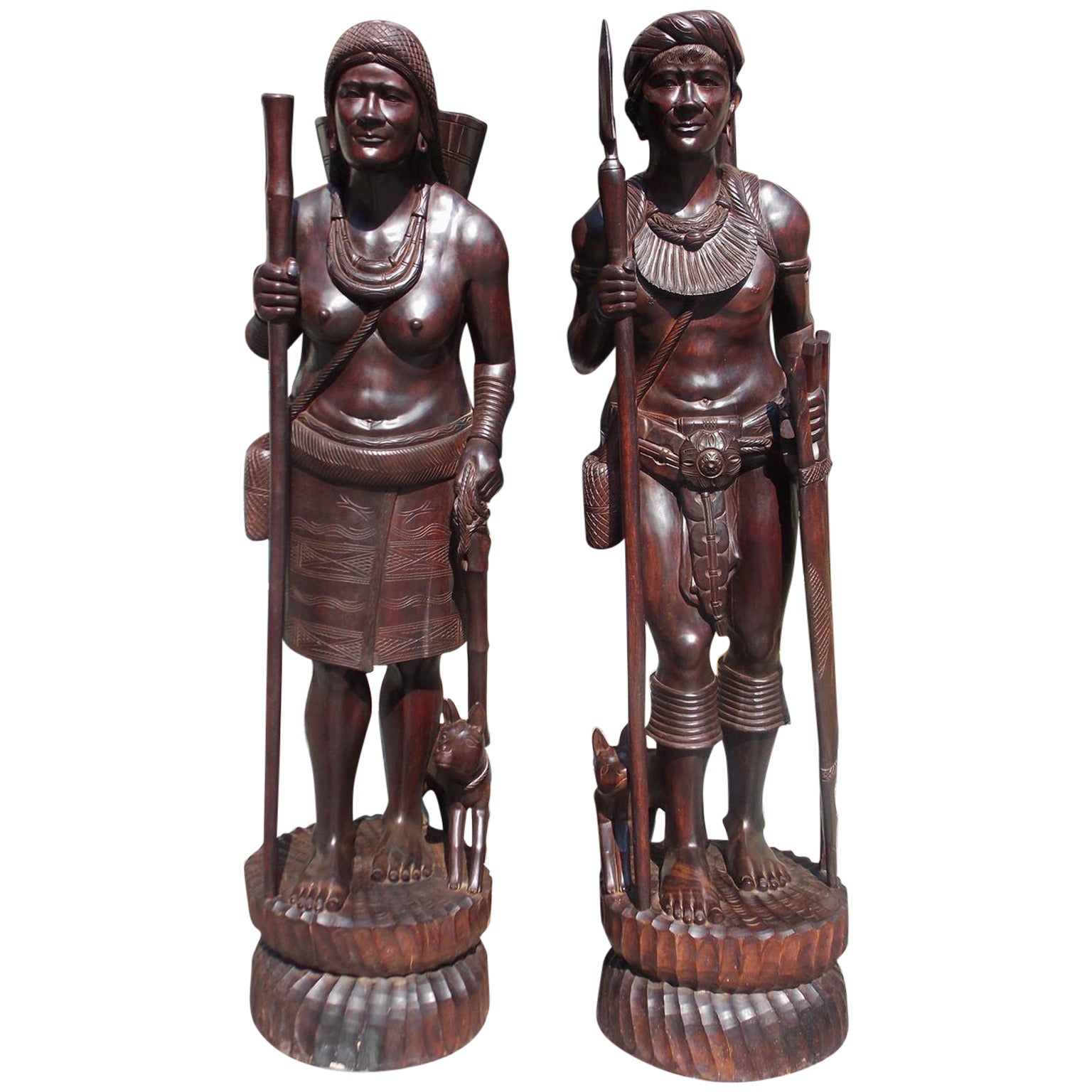 Pair of Igorot Tribesmen Figural Hunter and Huntress Carvings, circa 1940 For Sale
