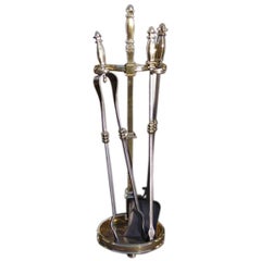 French Brass and Polished Steel Floral Finial Fire Tools on Stand. Circa 1840