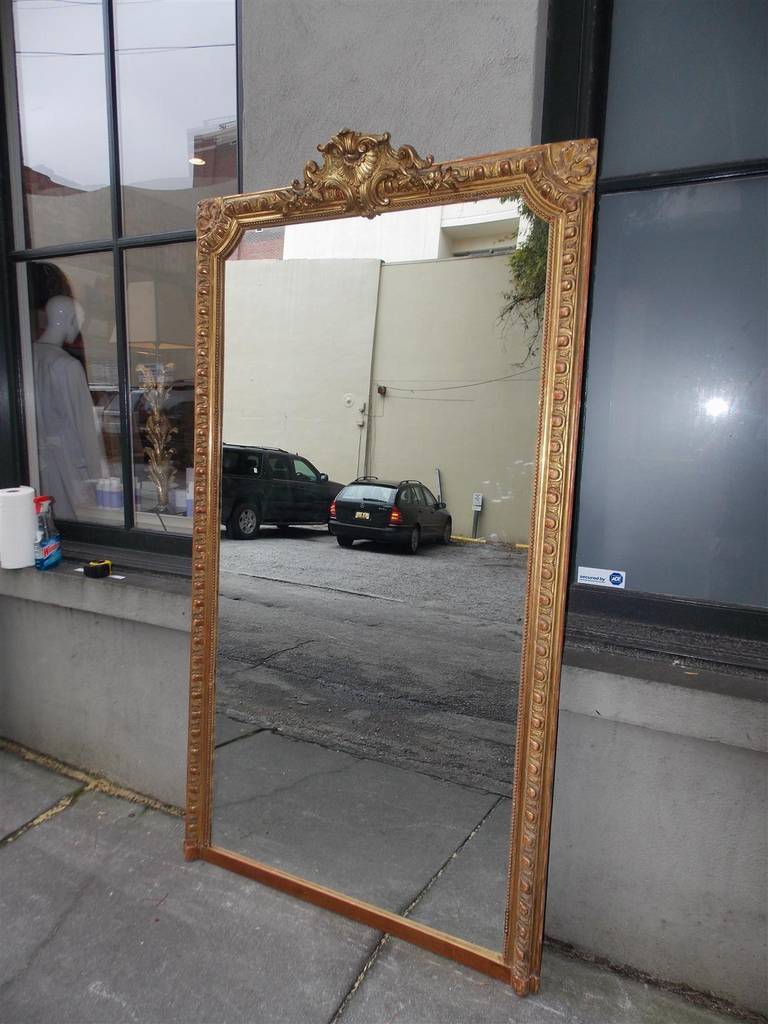 Louis Philippe French Gilt Carved Wood Red Lacquered Floral Crest Wall Mirror, Circa 1810 For Sale