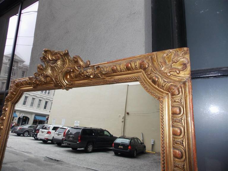 French Gilt Carved Wood Red Lacquered Floral Crest Wall Mirror, Circa 1810 For Sale 2