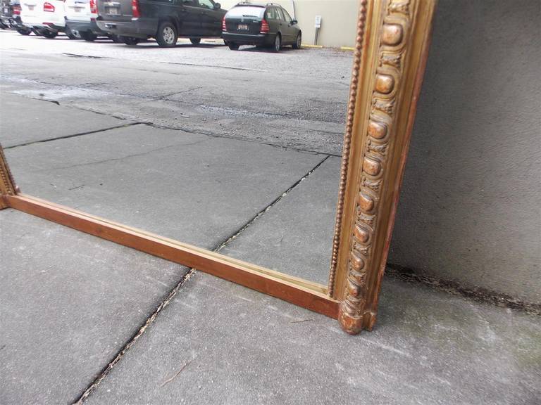 French Gilt Carved Wood Red Lacquered Floral Crest Wall Mirror, Circa 1810 For Sale 4