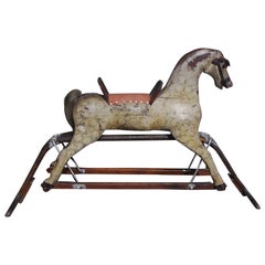 American Carved Wood & Faux Painted Rocking Horse.  Circa 1890