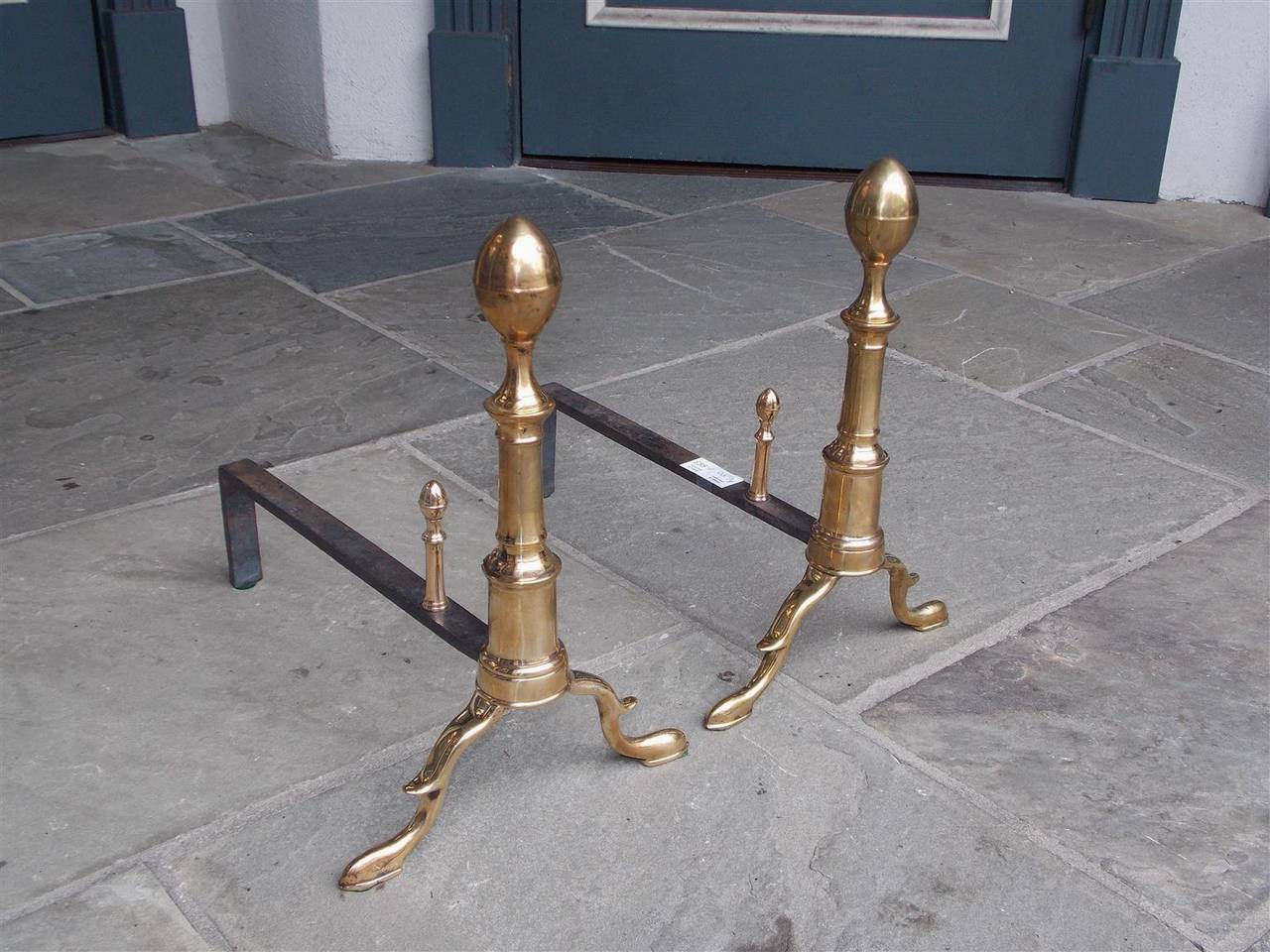 Pair of American brass lemon top andirons with turned bulbous plinths, matching log stops, and terminating on spurred legs with slipper feet. All original. Boston, Late 18th Century.