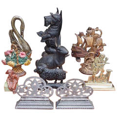 Group of American Painted Cast Iron and Polisherd Steel Doorstops. Circa 1880 10