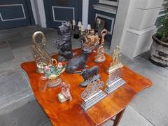 Group of American Painted Cast Iron and Polisherd Steel Doorstops.  Circa 1880