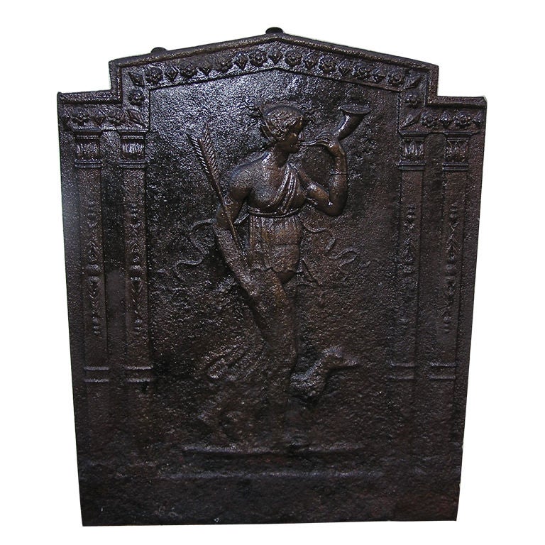 Piantana in ghisa inglese con figure e canini.  Circa 1780