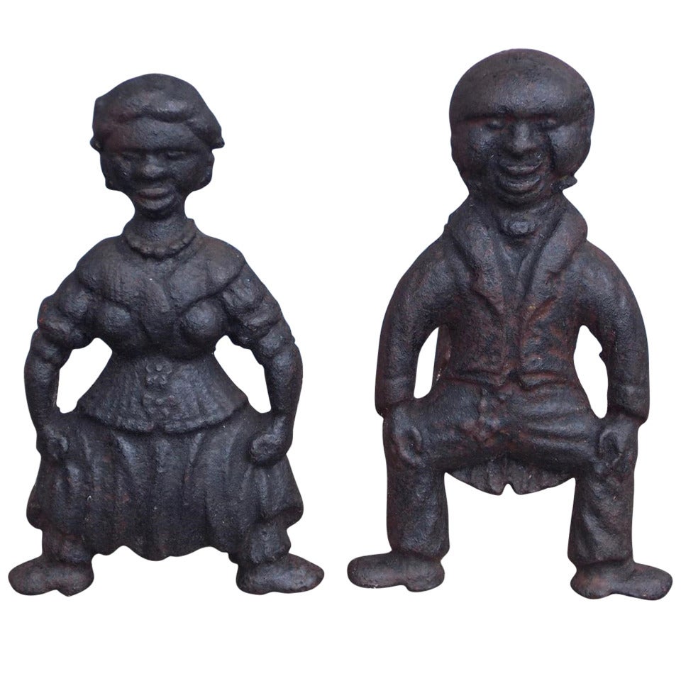 Pair of American Cast Iron Figural Andirons. Circa 1840