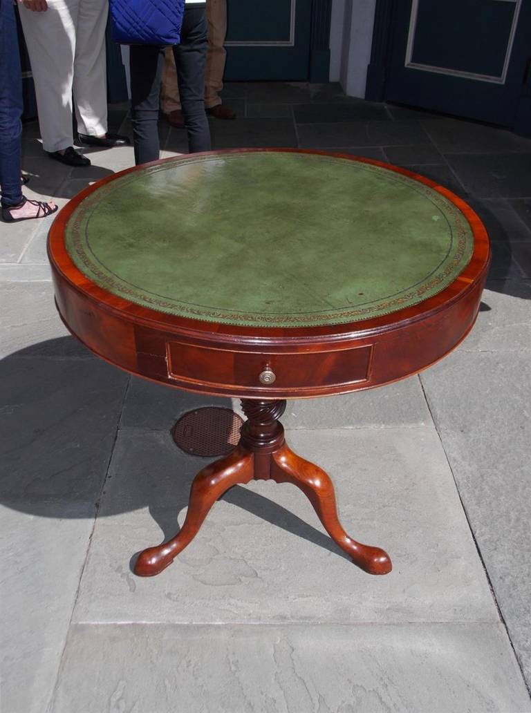 English mahogany three drawer leather top drum table with turned bulbous spiral pedestal, terminating on tripod base with slipper feet.  Early 19th Century