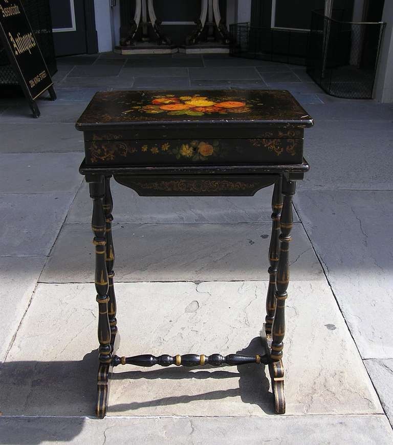 French hand painted and gilt flip top one drawer dressing table with decorative floral stenciling,  lined interior with original mirror, terminating on bulbous legs with cross stretcher.  Dealers please call for trade price.