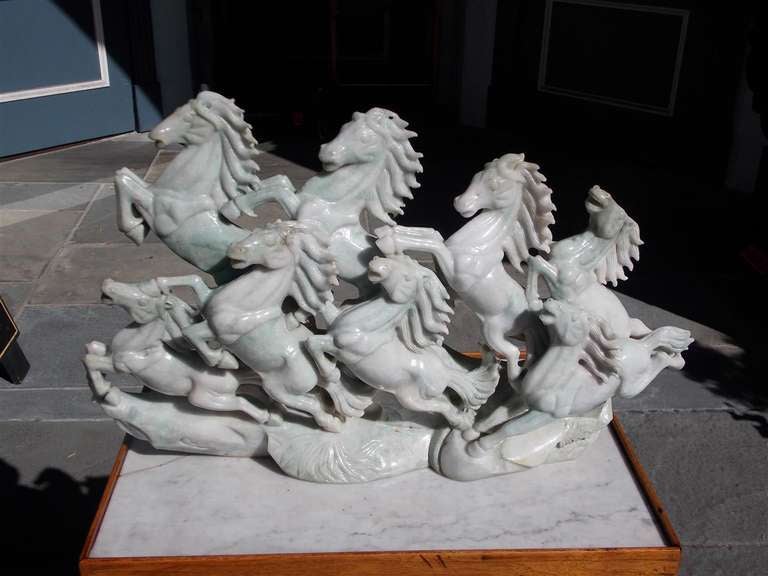 Chinese Nephrite Mutton fat Jade sculpture of  Eight horses of Wu.  20th Century.  Dealers please call for trade price.