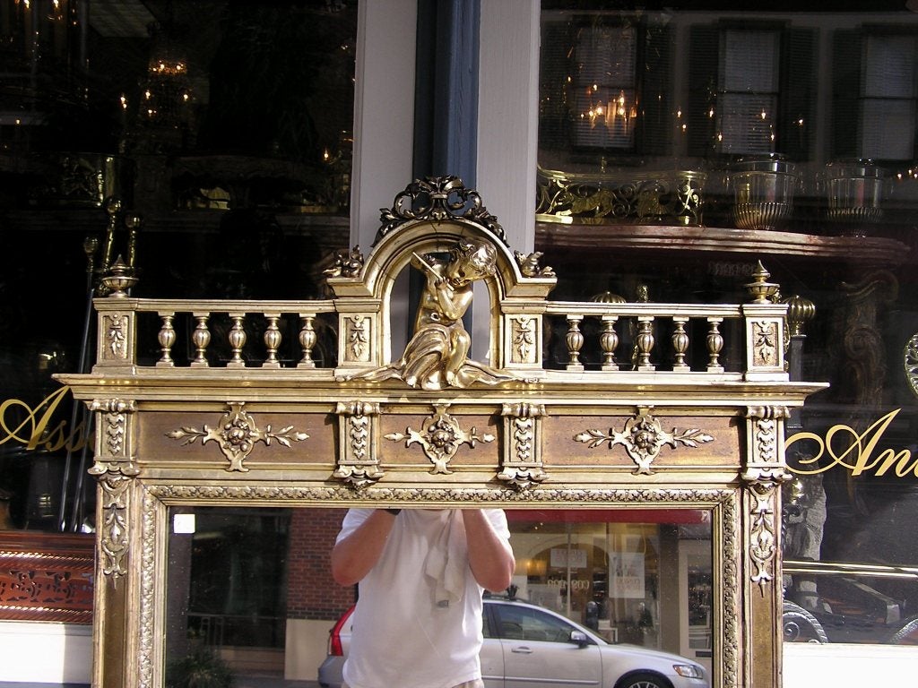 Hand-Carved French Silver Gilt and Gesso Cherub Gallery Foliage Wall Mirror, Circa 1790 For Sale