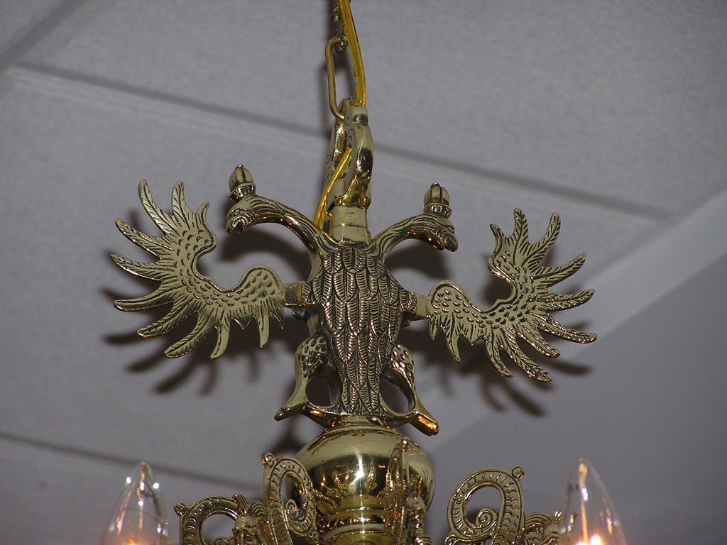 Dutch Colonial Brass Sixteen Arm Chandelier with Engraved Double Eagles, C. 1760 In Excellent Condition In Hollywood, SC