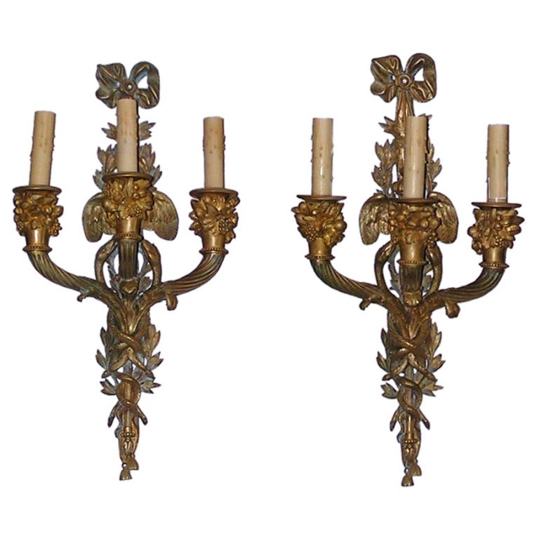 Pair of Italian Gilt Bronze Ormolu Ribbon & Foliage Three Arm Sconces. C. 1820 For Sale